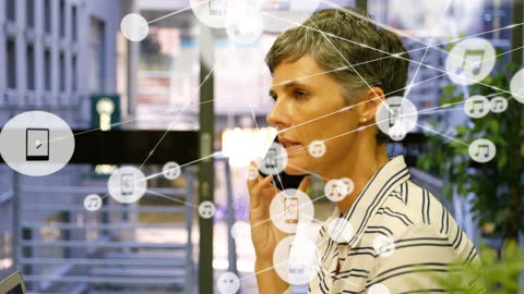 Senior Businesswoman Communicating with Digital Network Concept