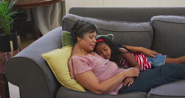 Grandmother and Granddaughter Napping on Sofa - Download Free Stock Images Pikwizard.com