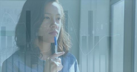 businesswoman contemplating data with financial graph overlay - Download Free Stock Images Pikwizard.com