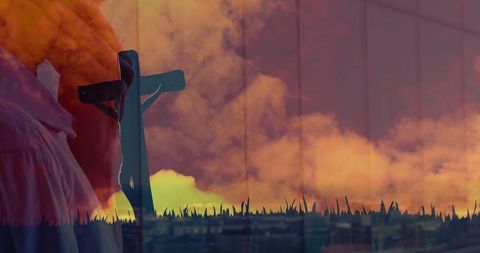 Gentle Reflection: Man Holding Wooden Cross at Scenic Skyline