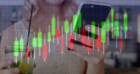Businesswoman Analyzing Stock Market Using Smartphone and Beverage