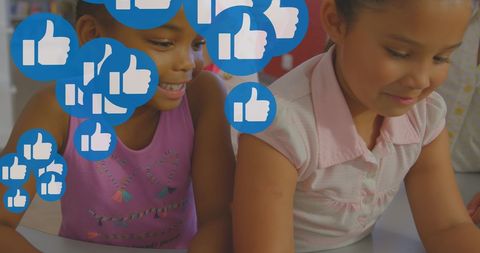 Happy diverse schoolchildren engaging with social media icons