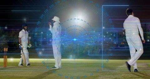 Night cricket match with hud overlay showing batsman, umpire, floodlights and tech