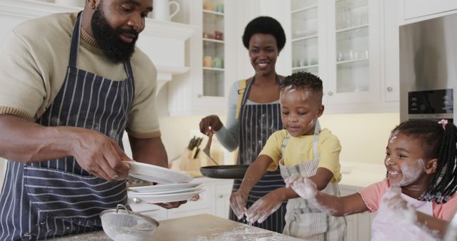 Happy African American Family Making Pancakes During Breakfast at Home - Download Free Stock Images Pikwizard.com