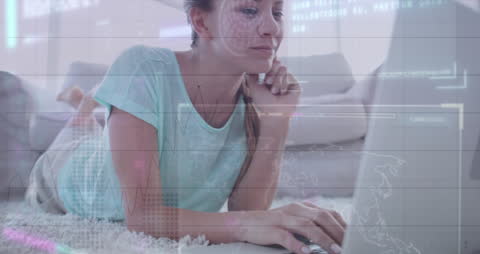 Woman Analyzing Financial Data on Laptop