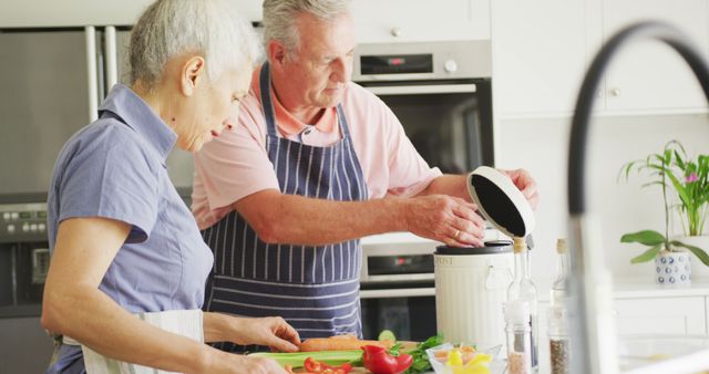 Caucasian Senior Couple Cooking Together in Modern Kitchen - Download Free Stock Images Pikwizard.com