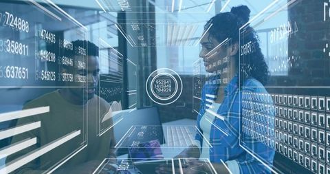 Diverse coworkers analyzing data on futuristic holographic interface