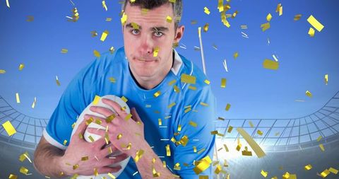 Caucasian Rugby Player Celebrating Victory at Stadium with Confetti