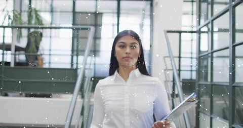 Confident Businesswoman with Digital Network in Modern Office