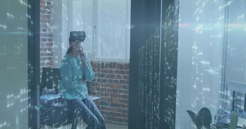 Businesswoman Wearing VR Headset with Digital Interface in Modern Office