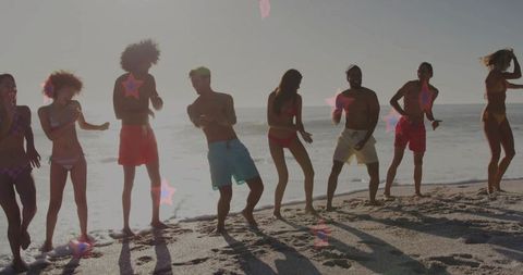 Friends Dancing Joyfully on a Sunny Beach