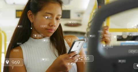 Commuter checking smartphone on bus with augmented reality social media overlays