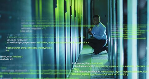 Engineer Using Tablet in Server Room with Digital Code Overlay - Download Free Stock Images Pikwizard.com