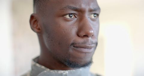 Pensive Military Soldier Reflecting While Enjoying Coffee
