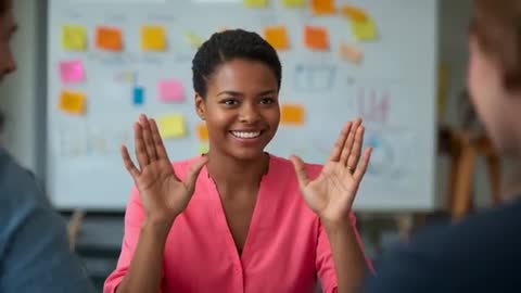 Young professional leading brainstorming session and explaining plan with hand gestures