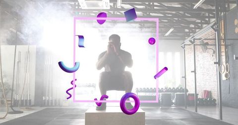 Backlit athlete squatting on plyo box with neon magenta frame and 3d geometric shapes