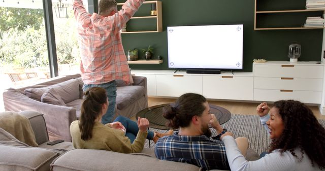 Friends Enjoying Video Game in Modern Living Room - Download Free Stock Images Pikwizard.com