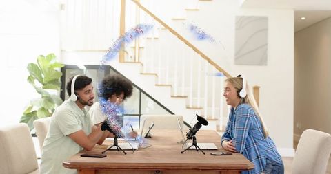 Recording podcast hosts collaborating at home with microphones, laptops, headphones