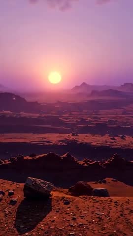 Vertical desert sunset video showing sun descending over plateau, softening light and extending boul