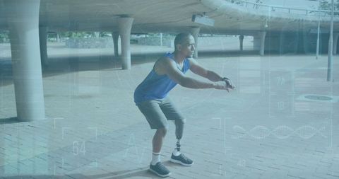 Athlete with prosthetic limb exercising in urban environment