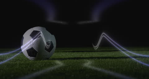 Soccer Ball with Neon Light Trails at Night