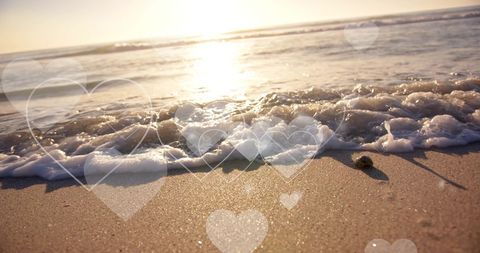 Hearts Floating Over Sunny Sands and Waves