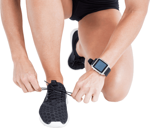 female athlete tying shoes wearing fitness tracker isolated background - Download Free Stock Videos Pikwizard.com
