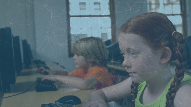 This video depicts two young students, a girl and a boy, using desktop computers in a school setting, with a digital network overlay symbolizing connection and technology. It is relevant for educational technology themes, promotions for educational tools, and illustrating modern learning environments. Ideal for use in websites, blogs, and advertisements focused on tech-infused education.