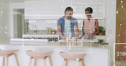 Team collaborating with augmented reality interface on kitchen island for home planning