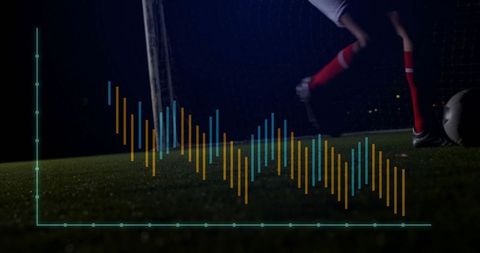 Soccer Player Kicking Ball with Data Overlay on Pitch at Night