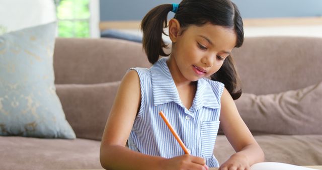 Young Girl Drawing at Home in Light-filled Room - Download Free Stock Images Pikwizard.com