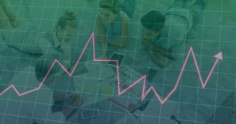 Business Team Collaborating on Data Analytics with Laptops