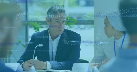 Diverse business team discussing global digital strategy