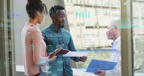 diverse business team analyzing data graphics with teamwork concept - Download Free Stock Images Pikwizard.com