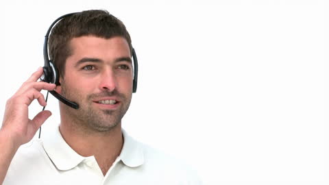 Smiling Man with Headset Engaged in Conversation