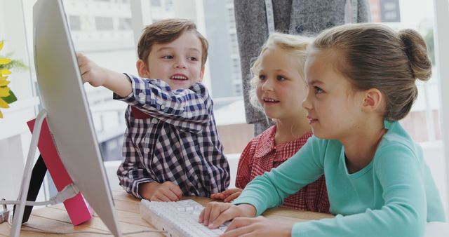 Children Learning Together with Computer in Classroom - Download Free Stock Images Pikwizard.com