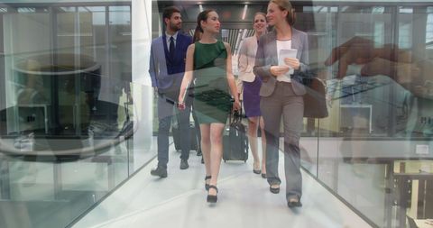 Business Team Collaborating in Modern Office with Technology Overlay