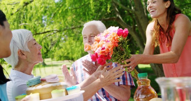 Happy Multigenerational Family Outdoor Picnic Celebrating Birthdays - Download Free Stock Images Pikwizard.com