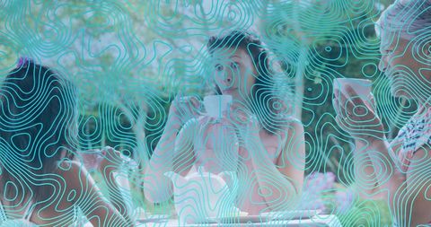 Multigenerational women enjoying outdoor tea on garden patio with turquoise contour overlay