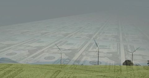 Wind turbines over farmland with dollar overlay representing renewable energy investment
