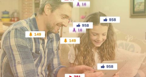 Father and Daughter Exploring Social Media Together