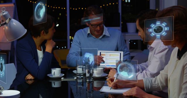 Business Team Using Augmented Reality Technology in Night Office Meeting - Download Free Stock Images Pikwizard.com