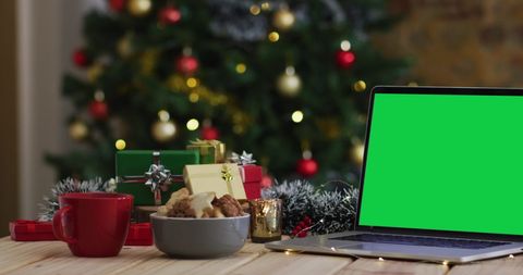 Christmas Decoration Desk with Green Screen Laptop for Holiday Themes - Download Free Stock Images Pikwizard.com