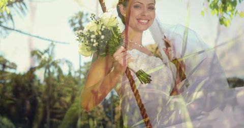 Joyful Bride Swinging Outdoors in Sunny Garden with Bouquet - Download Free Stock Images Pikwizard.com