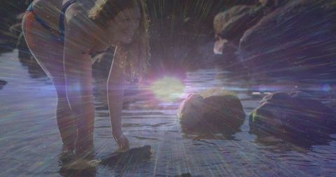 Exploring Coastal Tidal Pools at Sunset with Lens Flare