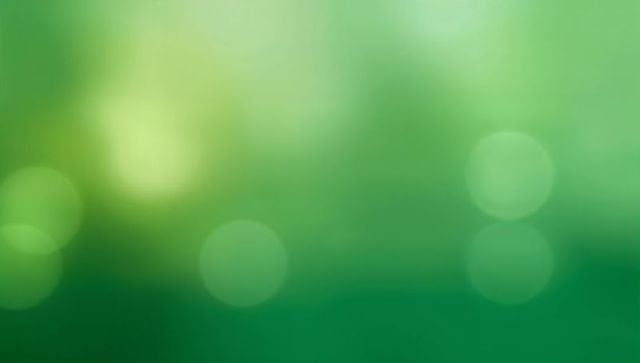 Green Bokeh Gradient Background Featuring Soft Defocused Orbs, Mint and Emerald Tones