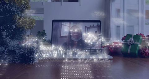 Connecting via holiday video call with masked participant and digital data overlay