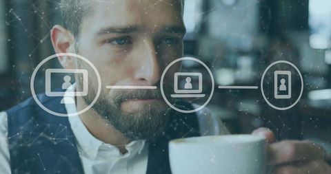 Businessman Analyzing Digital Data Network While Drinking Coffee