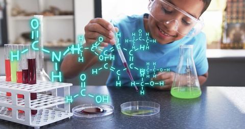 Child conducting chemistry experiment in science lab