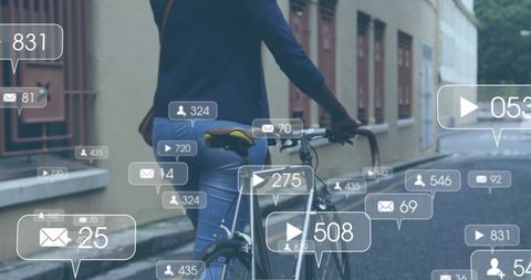 Social Media Notifications Surrounding Woman Biking in Urban Environment